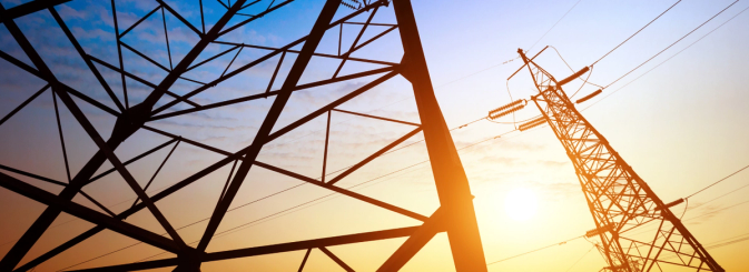 Electrical pylons at sunset