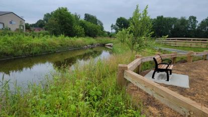 Benches and supported riverbank drainage after construction at Russell Park