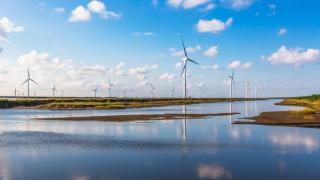 Wind turbines next to a lake in Scotland