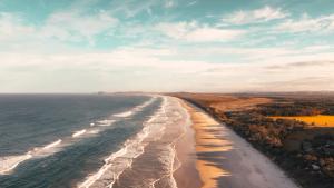 Aerial view of Seven Mile Beach at Broken Head looking back to Lennox Head, Australia