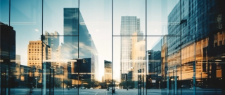 Reflections of financial buildings in glass