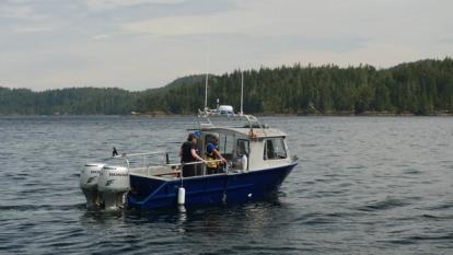Boat work crew on the water
