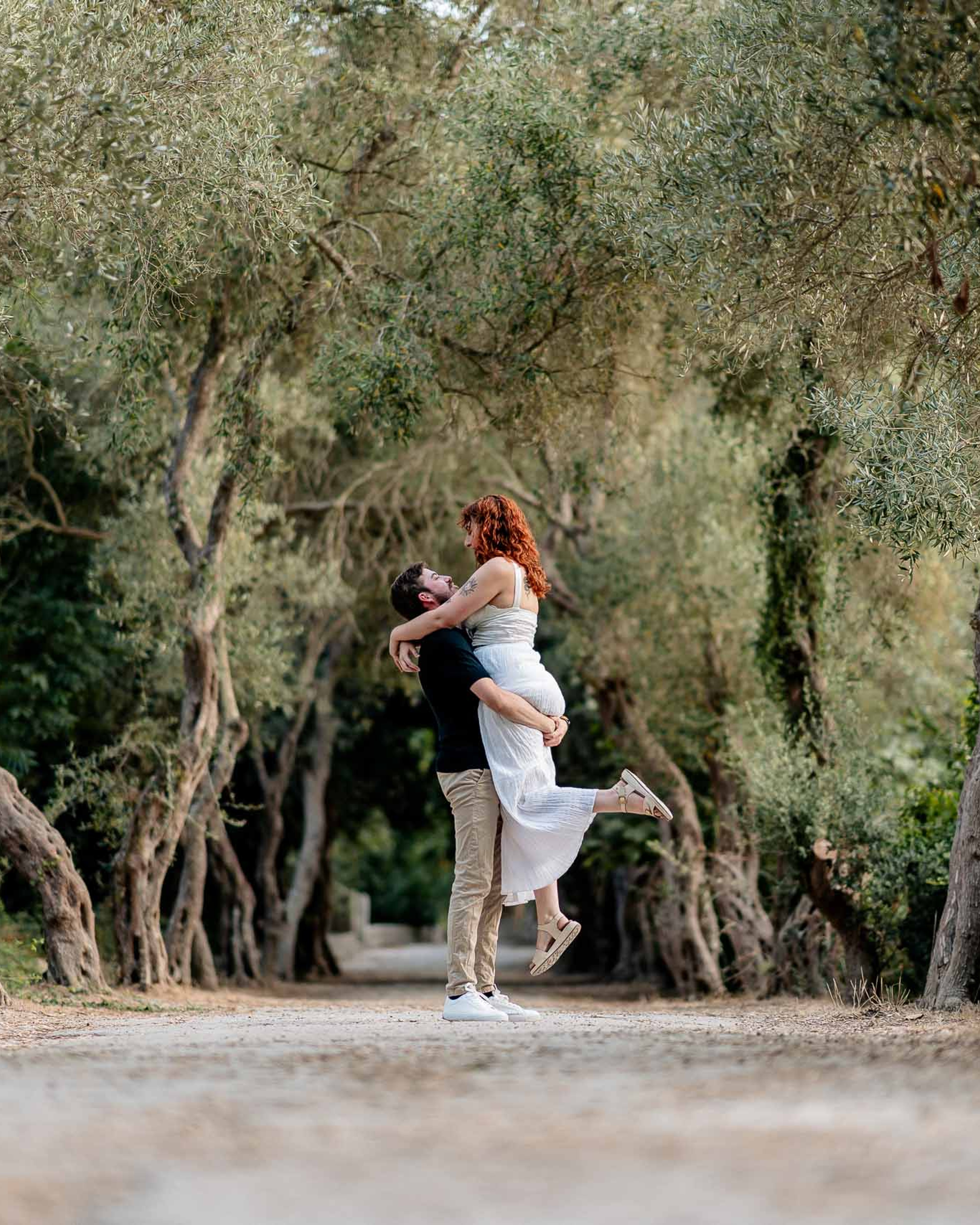 Jay and Cristina during their pre-wedding photoshoot among the olive trees at Buskett Woodlands in Rabat, Malta.