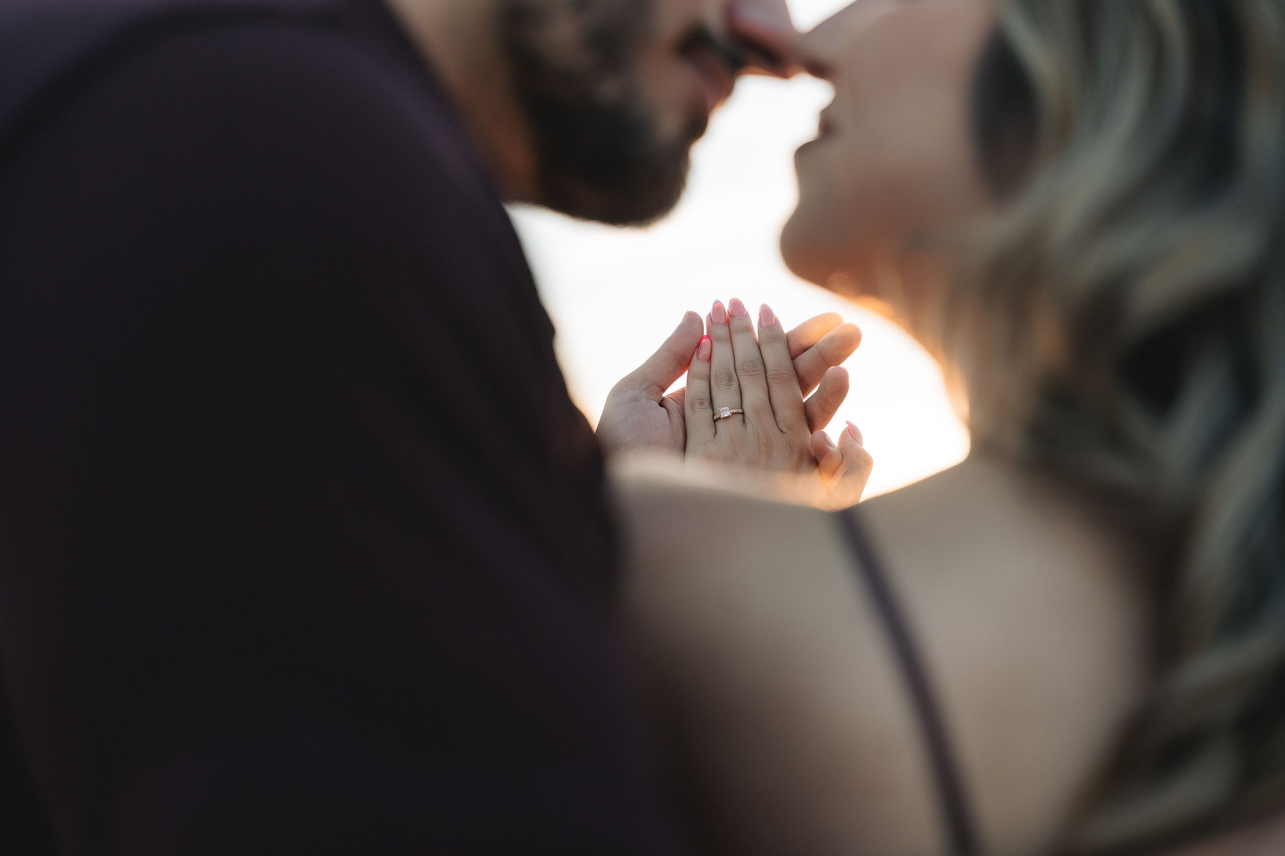 ngagement ring photographed during a surprise proposal at Dingli Cliffs, Malta