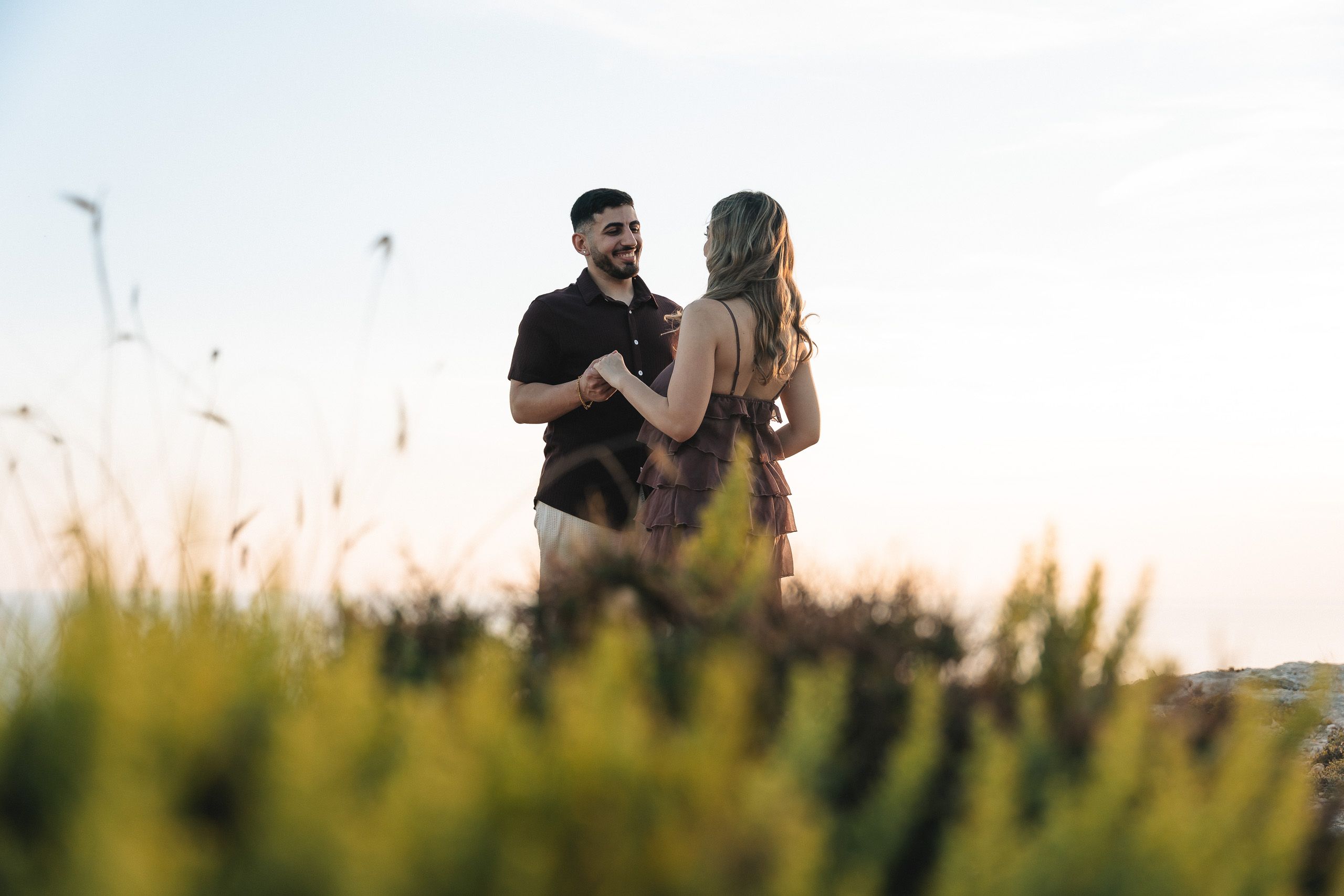 Couple portrait during a Dingli Cliffs proposal photography session in Malta