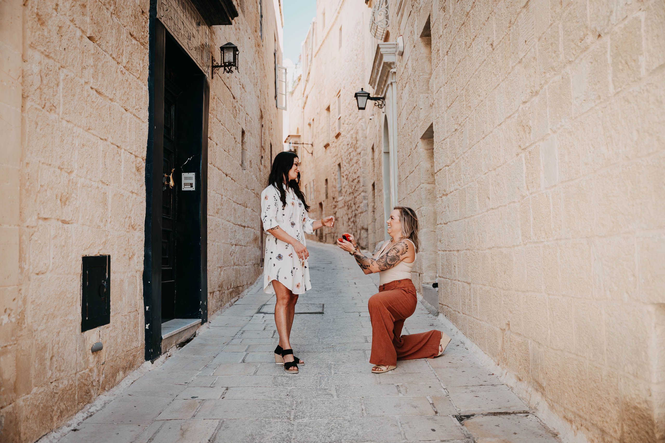 Surprise marriage proposal in a historic street in Mdina, Malta