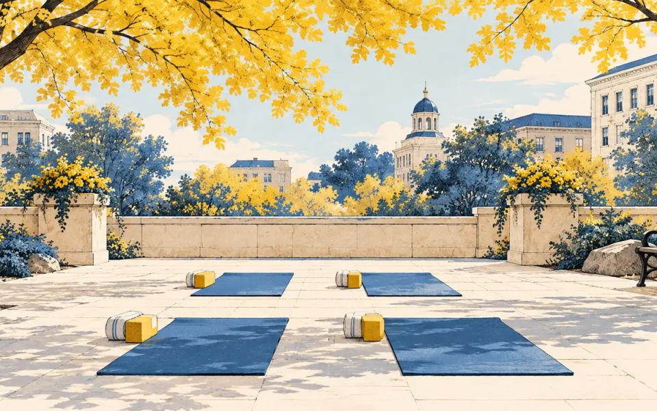 Four yoga mats in an illustrated outdoor plaza beneath autumn trees.