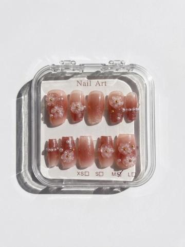 Debutante press-on nails in their case
