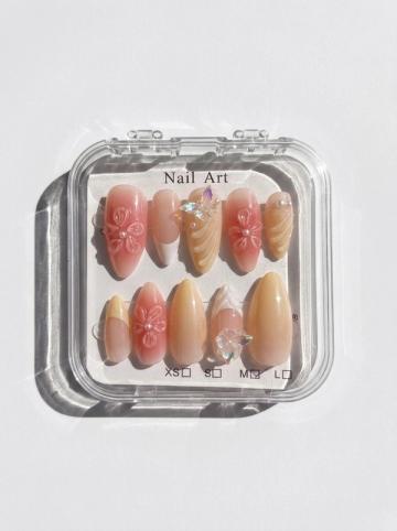 Minx press-on nails in their case
