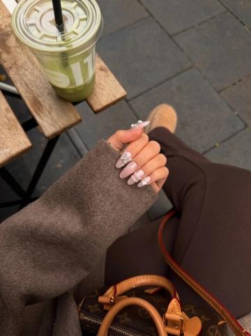 Iced press-on nails worn