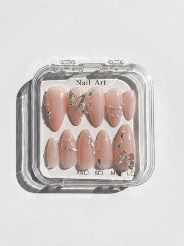 Iced press-on nails in their case