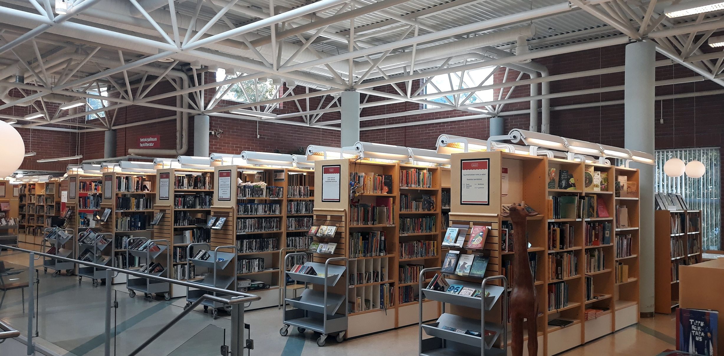 Bookshelves in a library hall.
