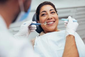 Woman smiling during dental checkup