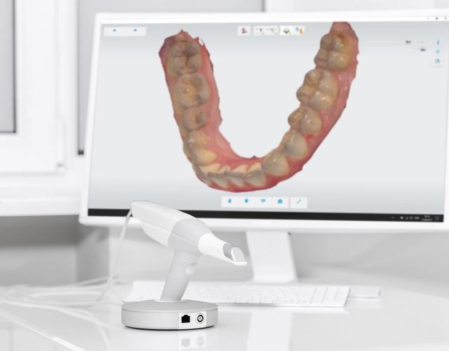 a computer monitor with a picture of a mouth on it .