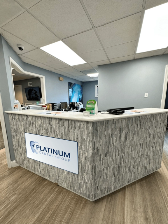 a dental office with a platinum dental group sign