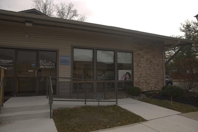 three women are taking a selfie together and smiling .
