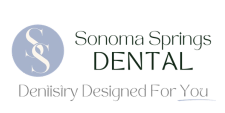 sonoma springs dental logo on a black background