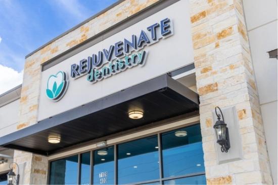 the front of a dental office with a sign that says rejuvenate dentistry .