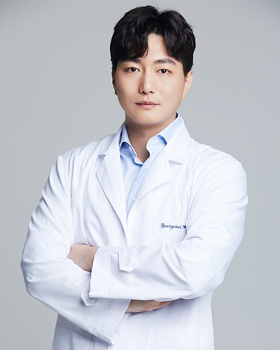 a man in a white lab coat with the name springfield on it