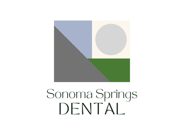 sonoma springs dental logo on a black background