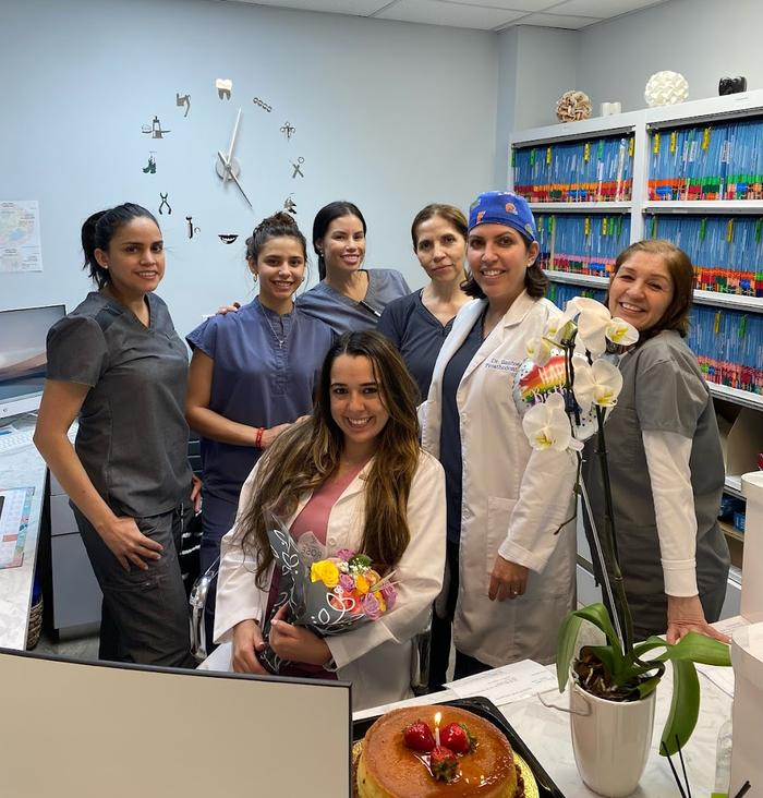 a group of female doctors are posing for a picture