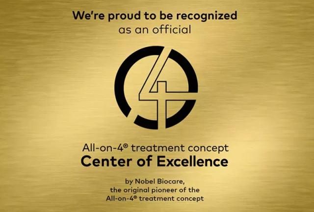 a gold sign that says `` we 're proud to be recognized as an official '' .