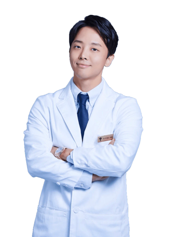 a man in a white coat and tie has a name tag that says j.k. park on it