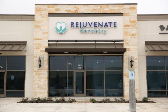 the front of a dental office with a sign that says rejuvenate dentistry .