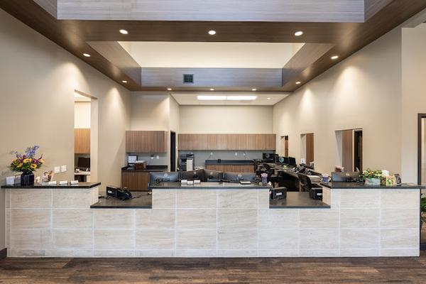 a large room with a long counter in the middle of it .