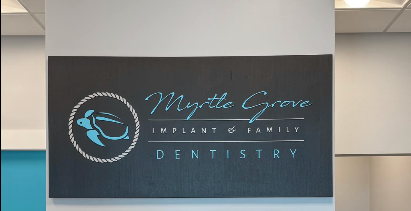 a sign for myrtle grove implant & family dentistry