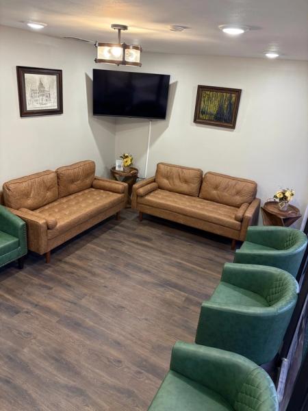 there is a couch in the middle of the room .
