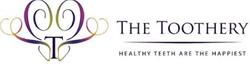 a logo for a dental office called the toothery .