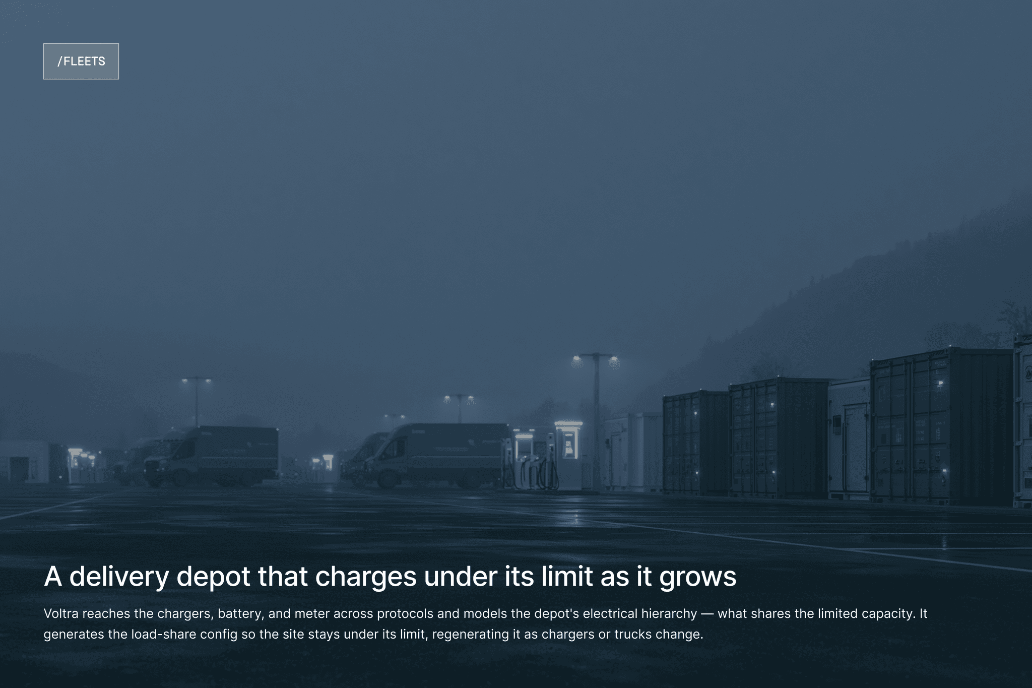 Row of delivery trucks at a depot in the fog.