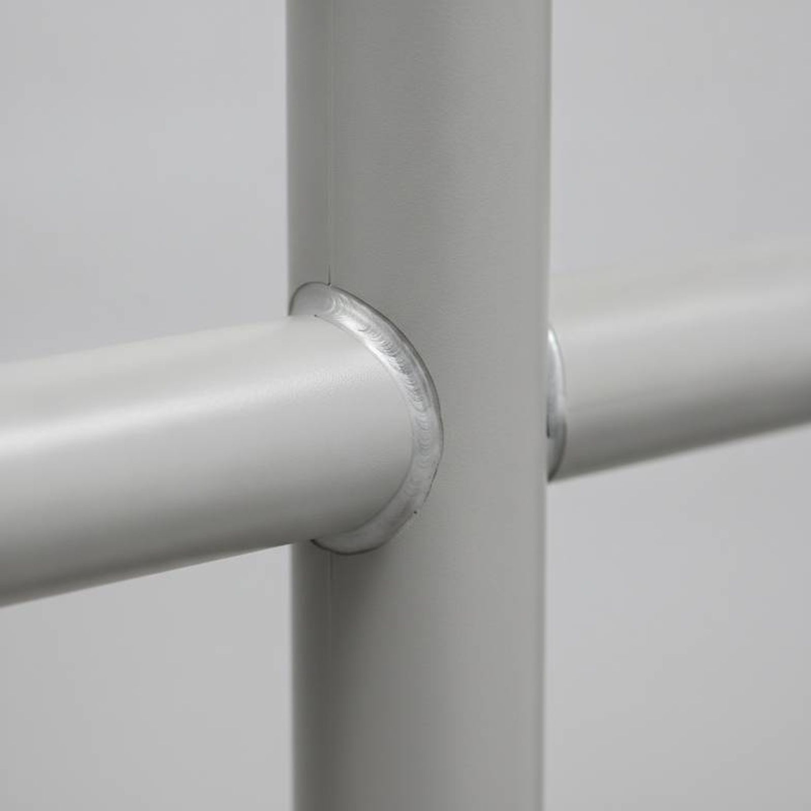 A close-up photo showing the thick steel and clean welding on a high-quality hospital bed extension kit.