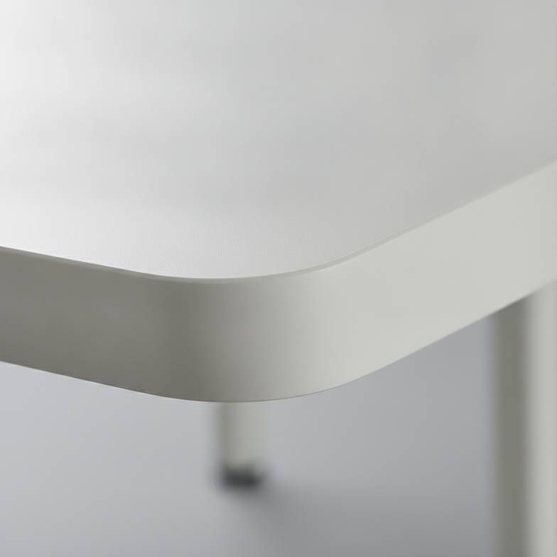A close-up of a hospital bed X-ray translucent platform showing the material texture