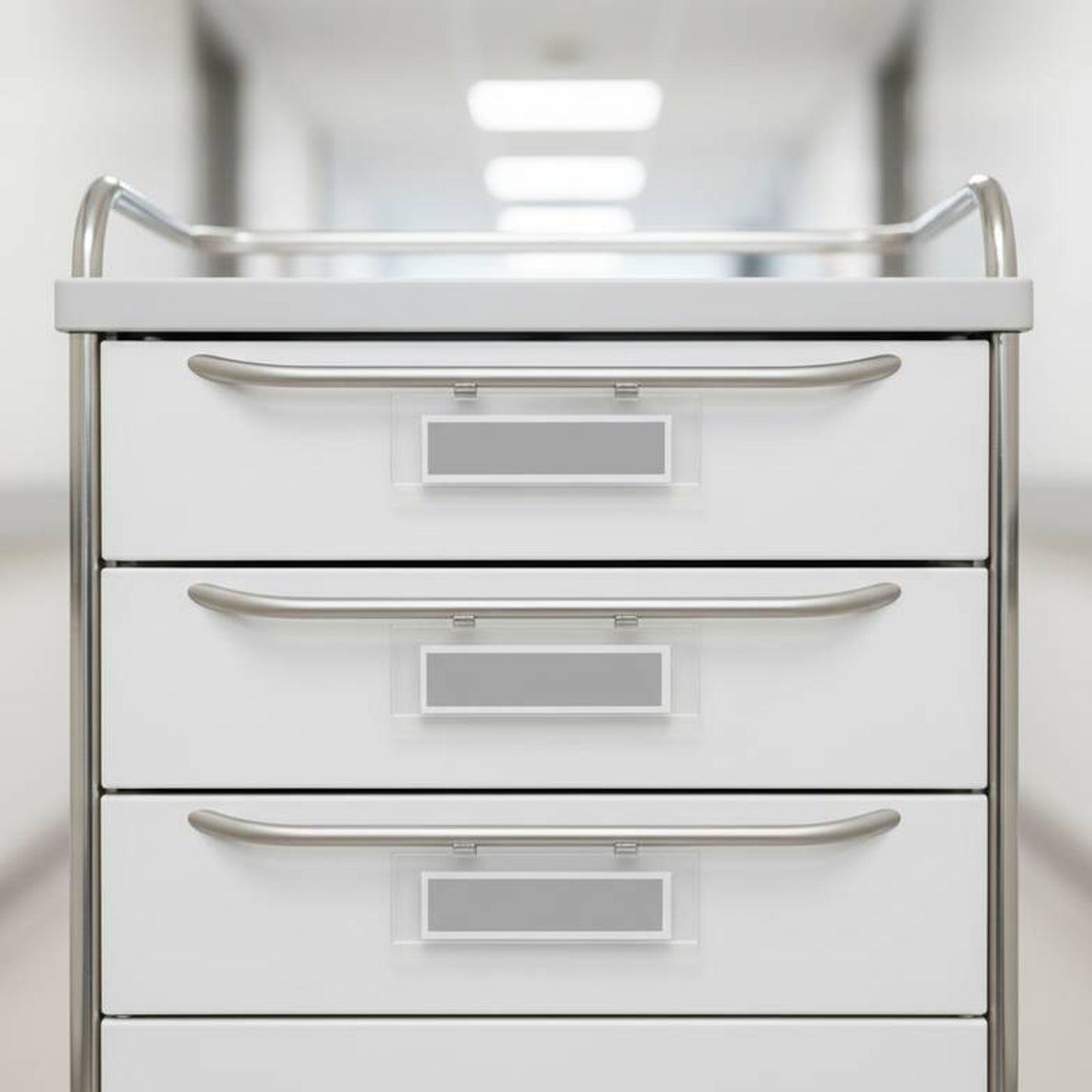 Clear, easy-to-read labels on the drawers of a medication cart