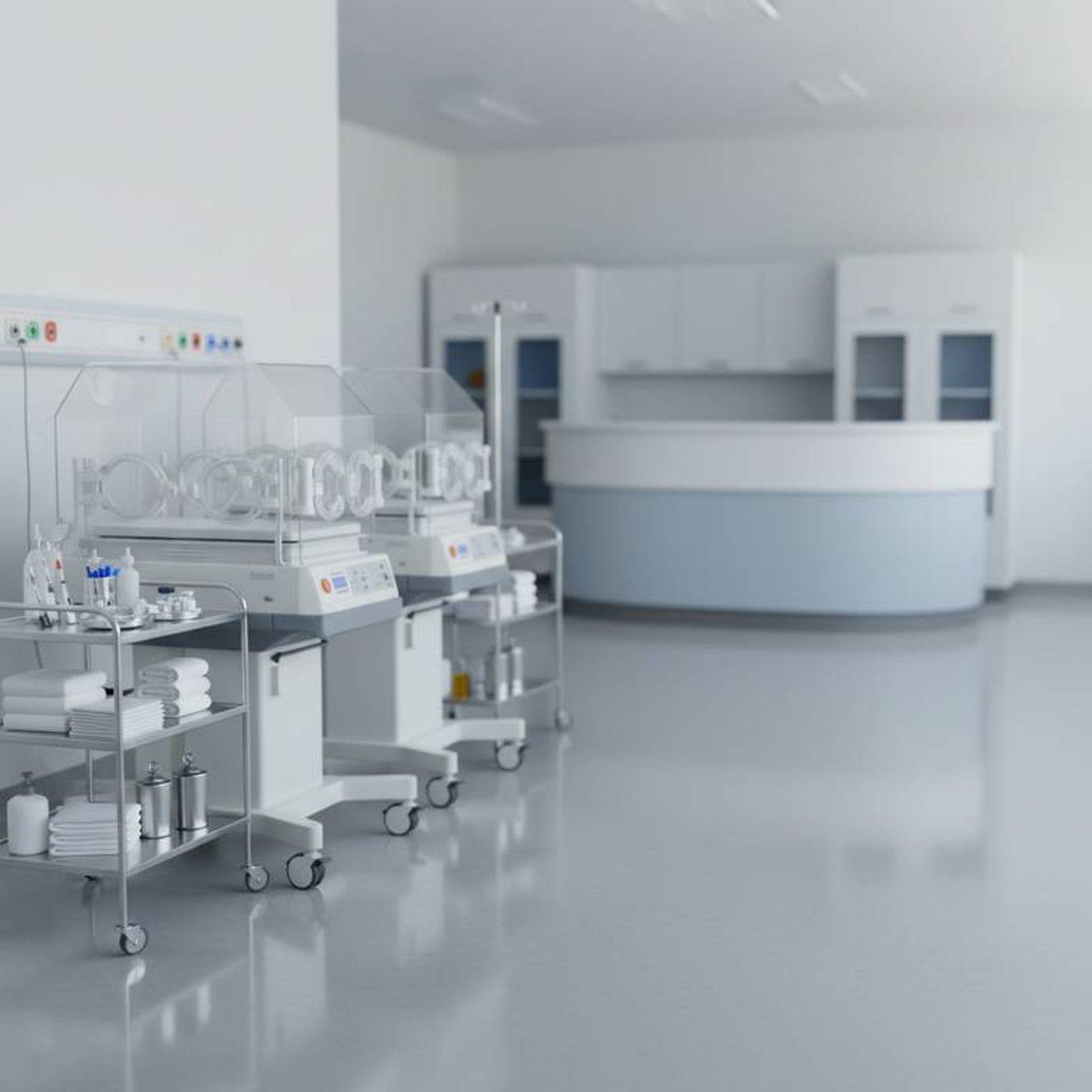 A well-organized neonatal ward with incubators and medical carts