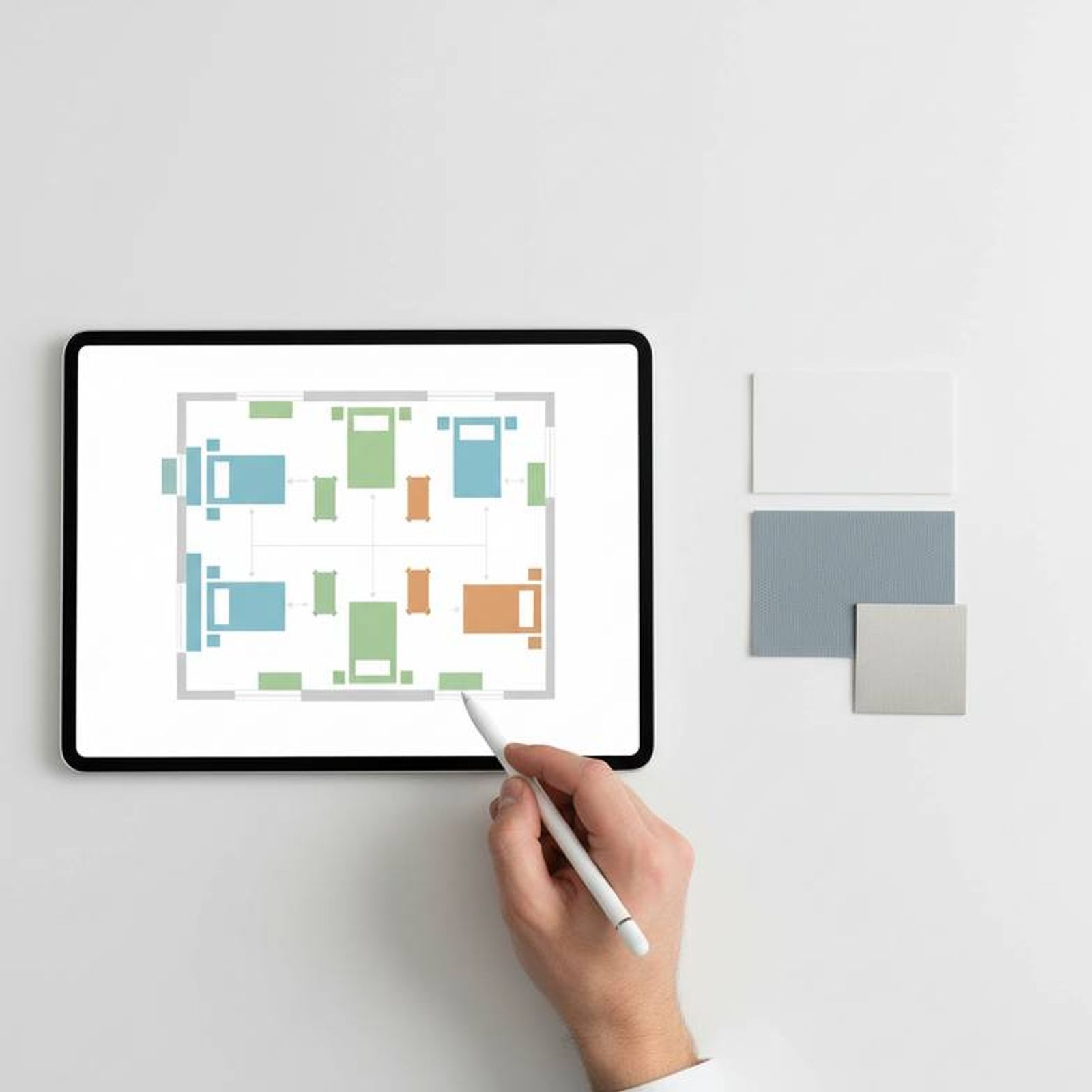 A medical planner reviewing blueprints for a hospital ward