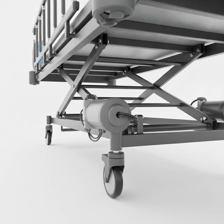 An electric hospital bed in its lowest position, highlighting the limited under-bed clearance near the actuators.