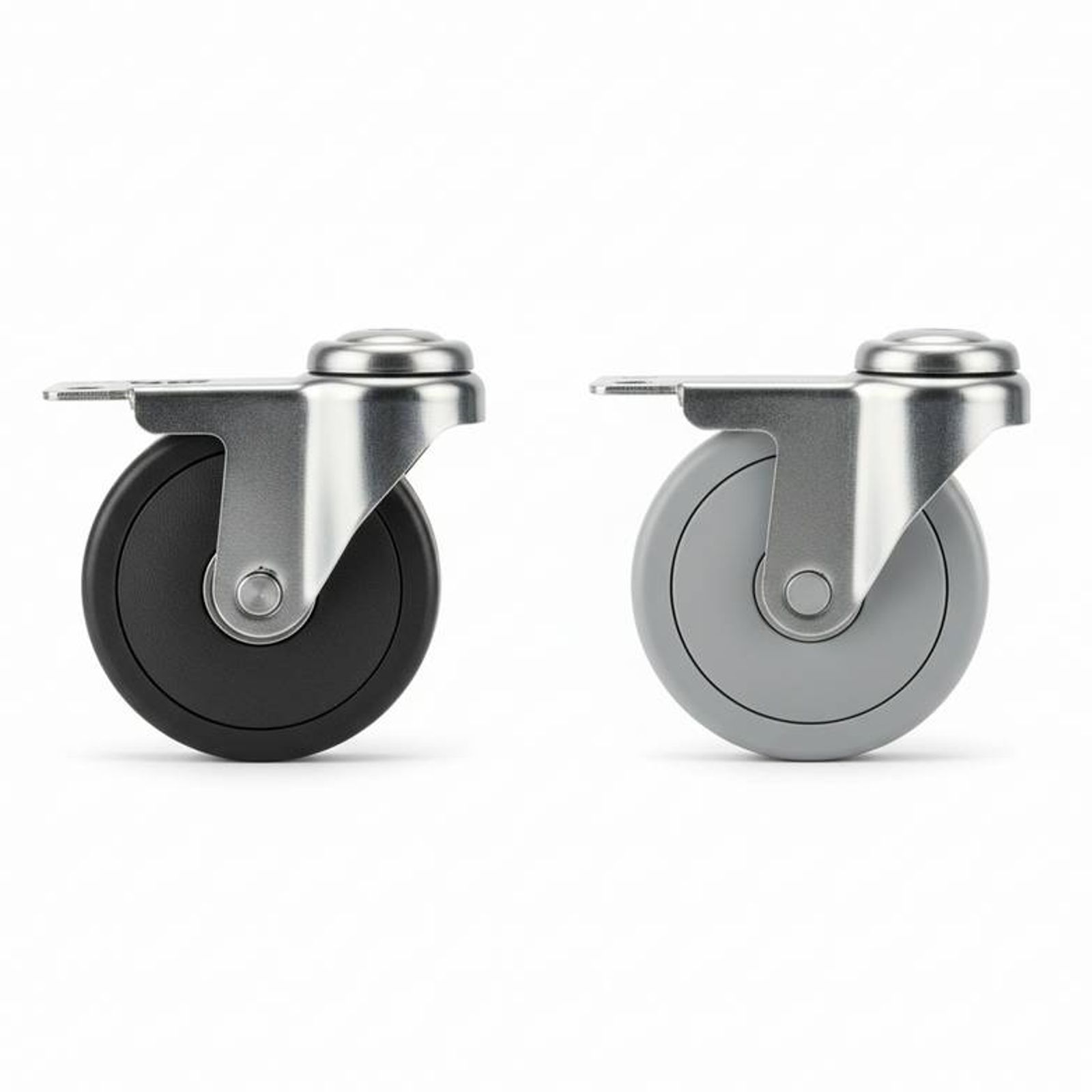 Two different caster wheels side-by-side: one high-temperature caster for autoclaves and one standard non-marking caster.