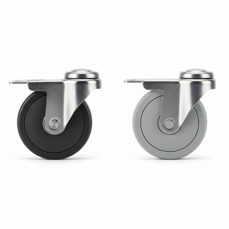Two different caster wheels side-by-side: one high-temperature caster for autoclaves and one standard non-marking caster.