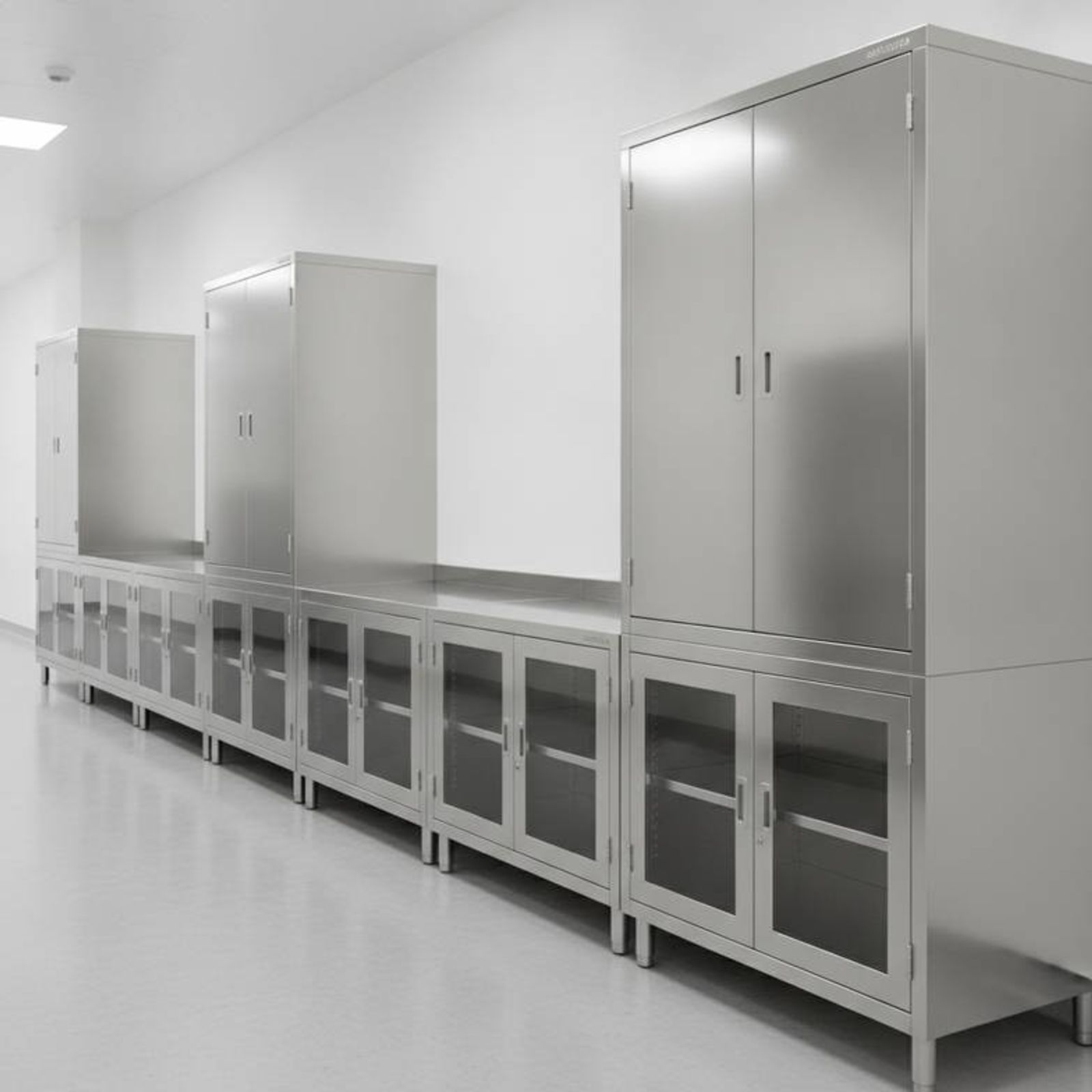 A row of high-quality stainless steel medical cabinets in a clean hospital corridor
