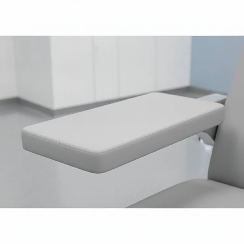 Close-up showing the flat, wide armrest of an infusion chair.