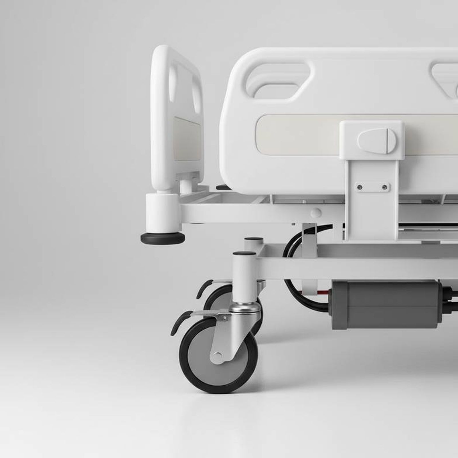 A close-up of a hospital bed's components like rails and wheels
