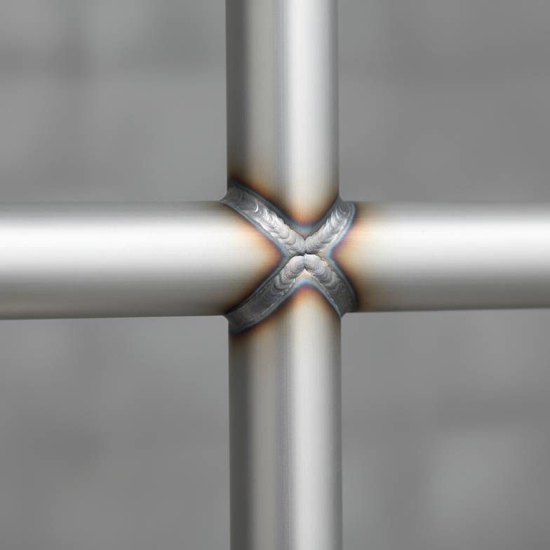 A close-up view of the aluminum frame and welding on an ambulance stretcher