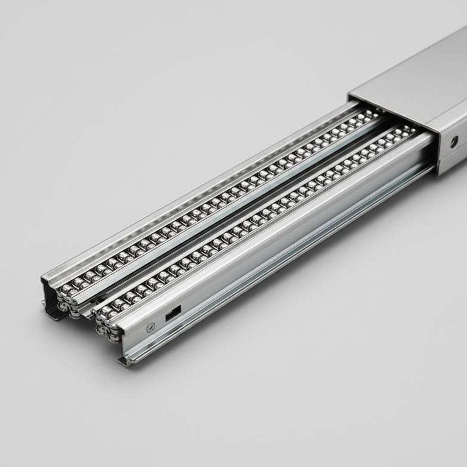 A close-up of high-quality medical trolley drawer runners showing the ball bearings and sturdy construction.