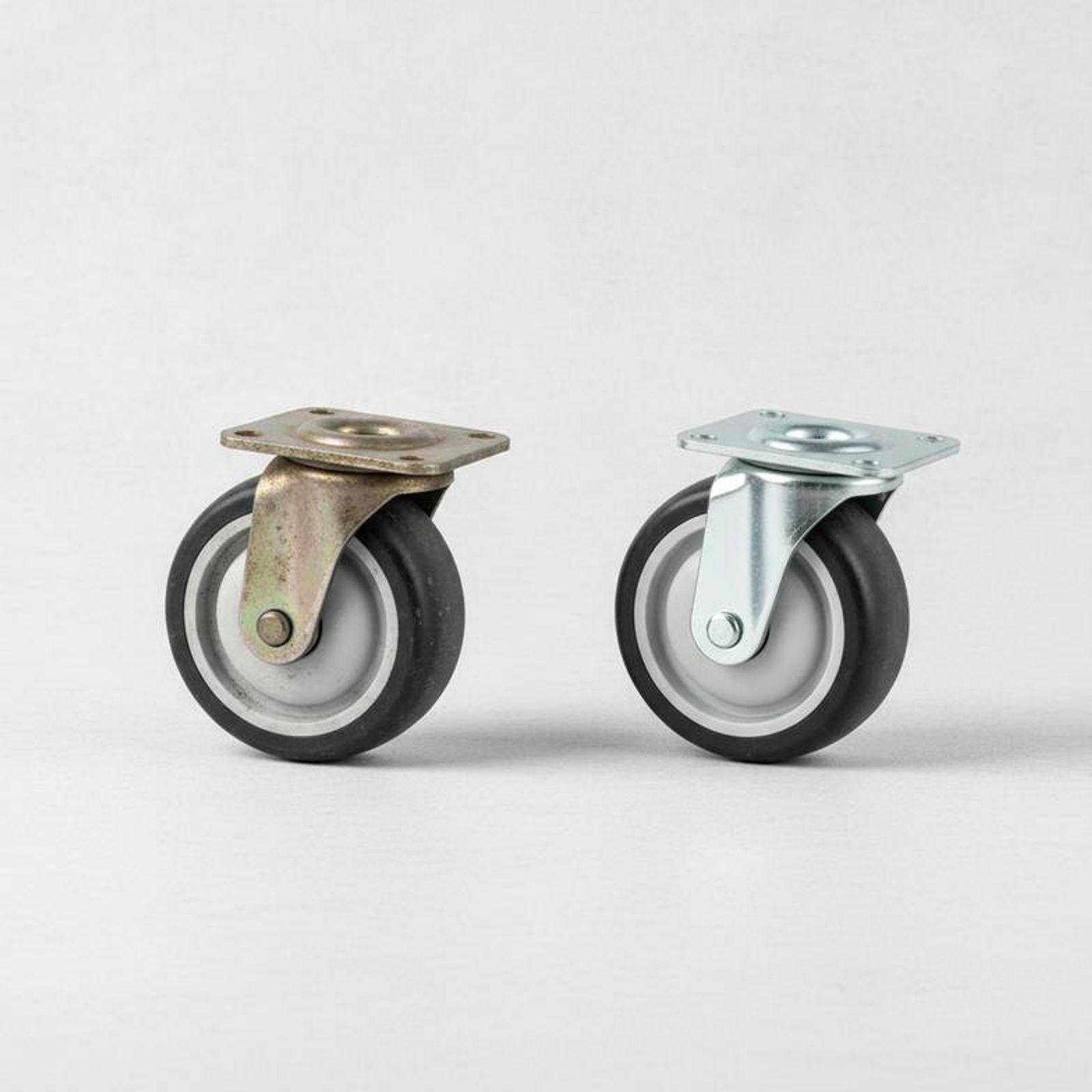 A broken hospital bed caster next to a new one, illustrating the need for spare parts and after-sales support.