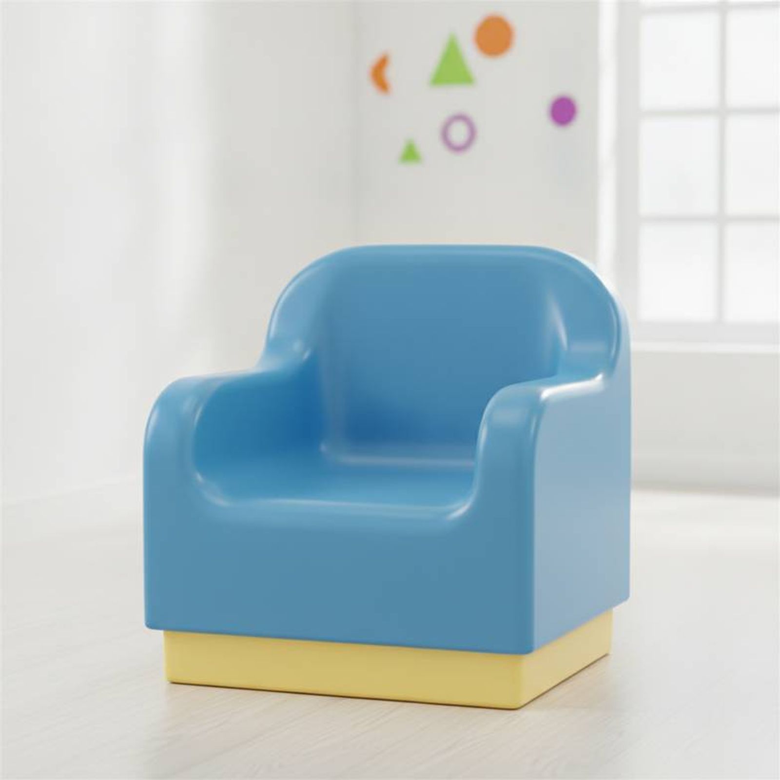 Child-friendly furniture with rounded edges and bright colors in a pediatric consultation room