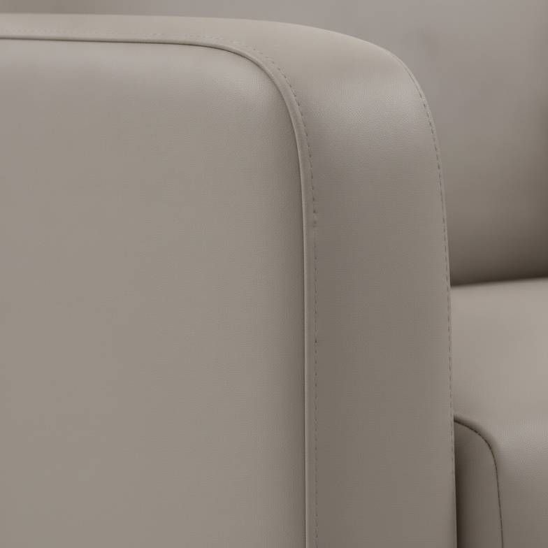 A close-up shot of durable, seamless medical-grade vinyl upholstery on an infusion chair.