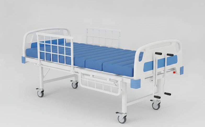 What is a manual hospital bed?